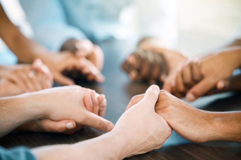 people holding eachothers hands