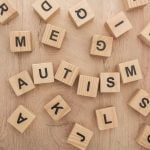 wooden letters spelling the word autism