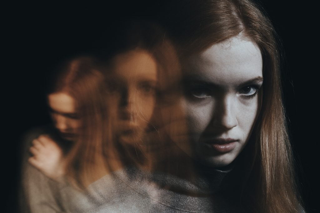 girl with multiple blurred shadows behind her