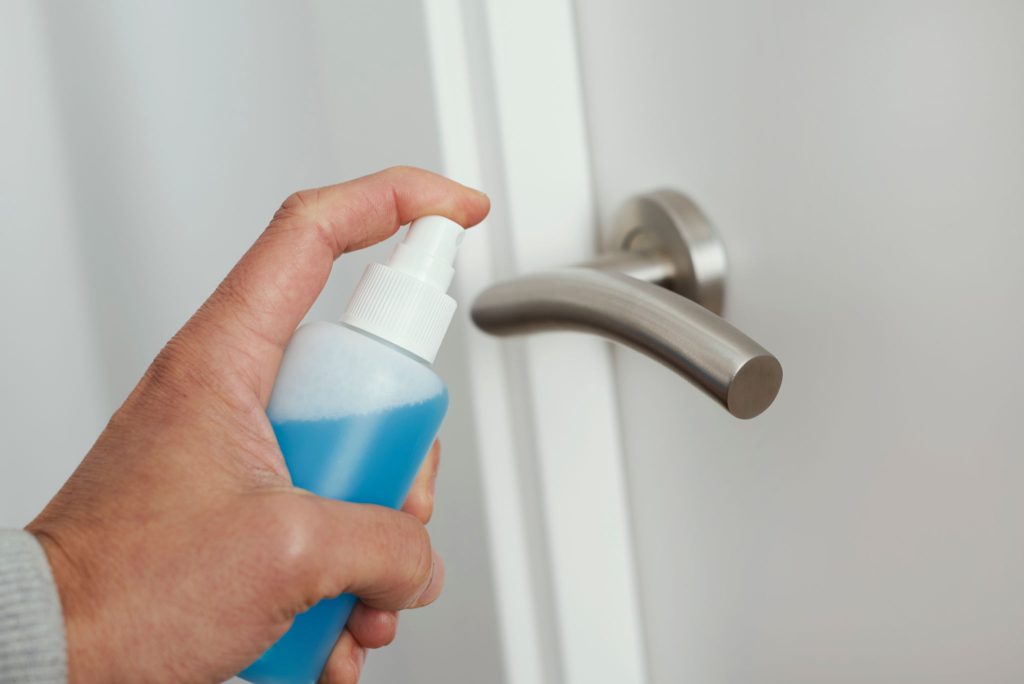 Man with mysophobia disinfecting